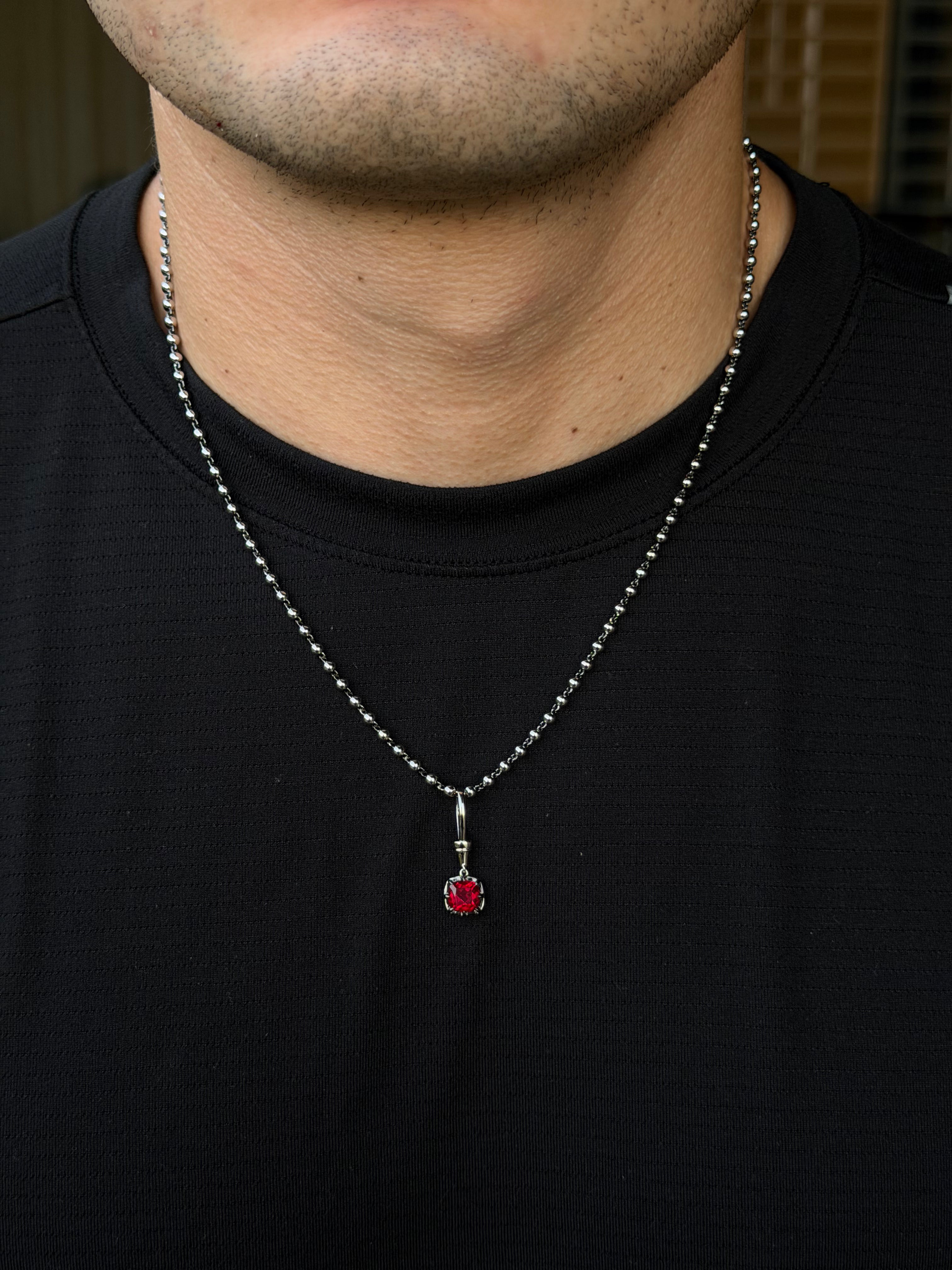 Blackened Claw-Set Ruby Charm