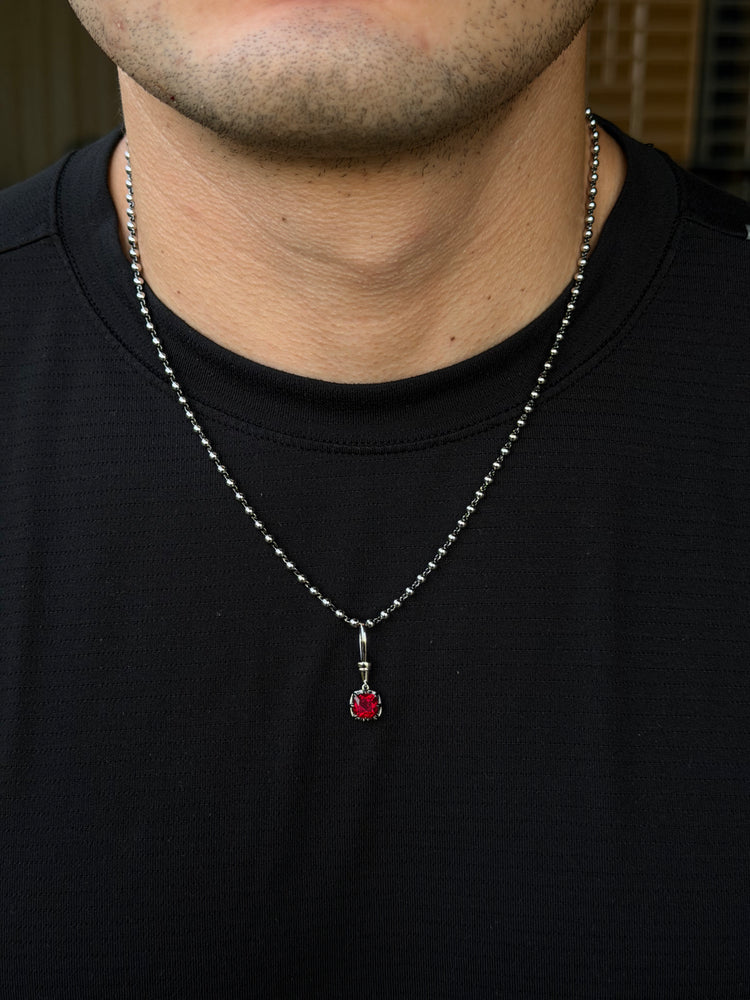 Blackened Claw-Set Ruby Charm