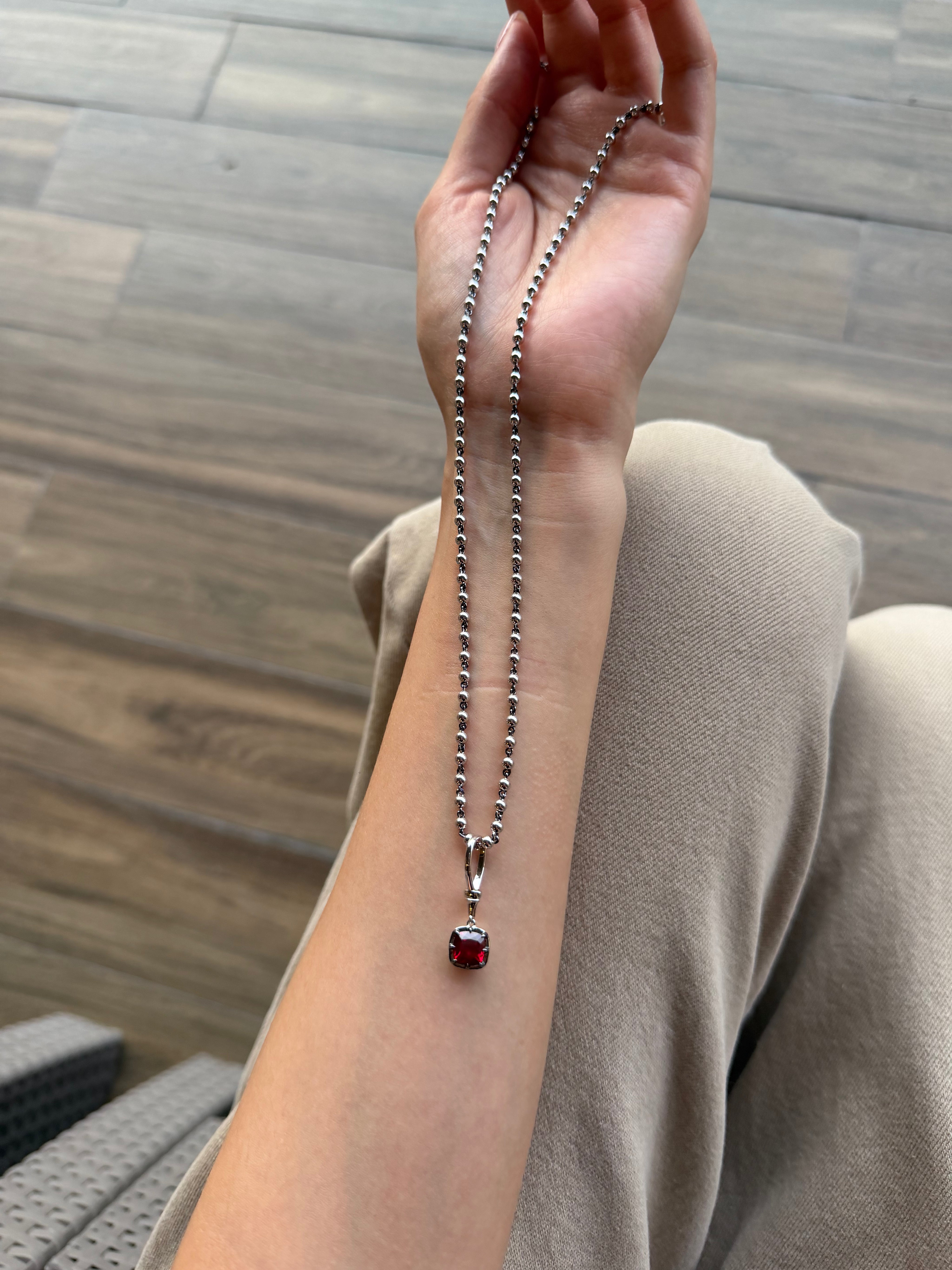 Blackened Claw-Set Ruby Charm