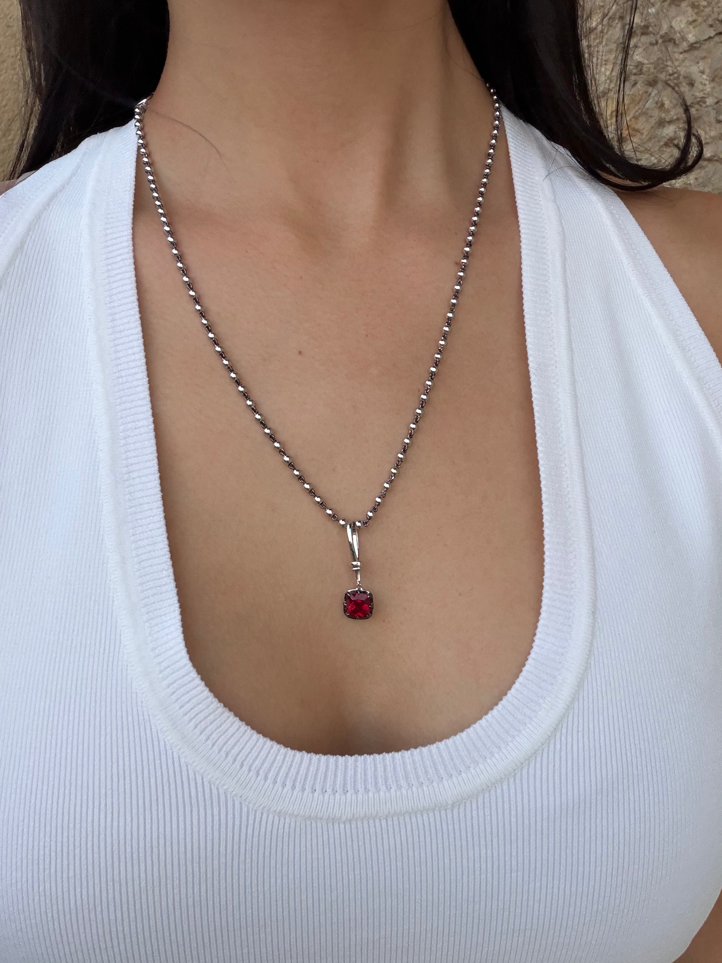 Blackened Claw-Set Ruby Charm